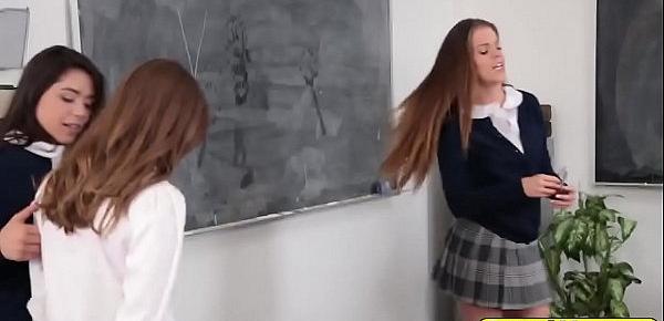  Three gorgeous schoolgirls are having hot lesbian three way in classroom